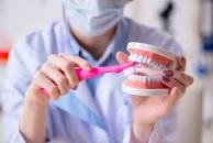 Скидка -50% на профессиональную чистку зубов в Astra Dent